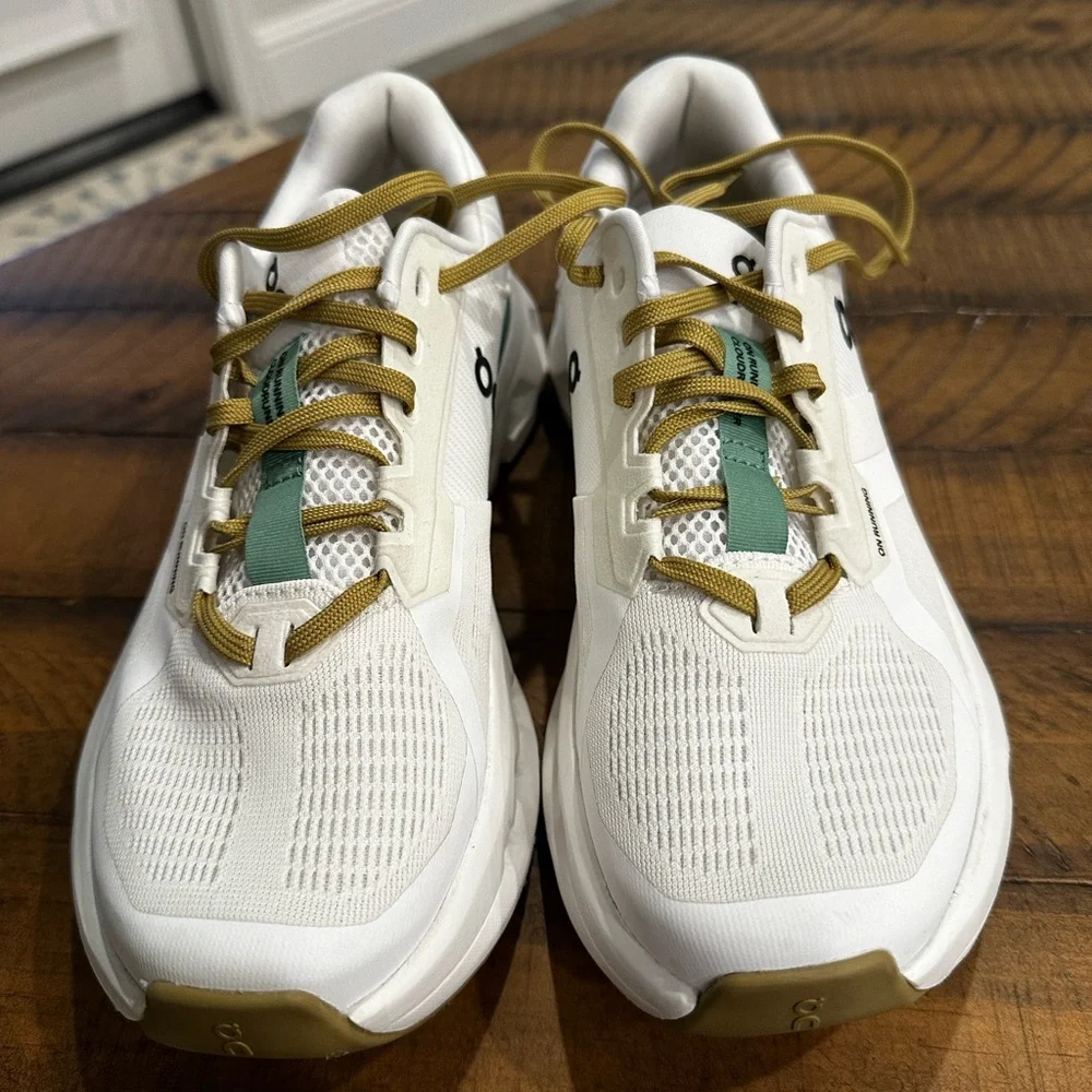 On Running White Sneakers with Green and Tan Accents - Picture 3 of 4